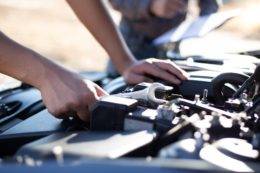 car-mechanic-has-checked-the-condition-of-the-engine-in-wrench-car-repair-service-concept_t20_axdaa6